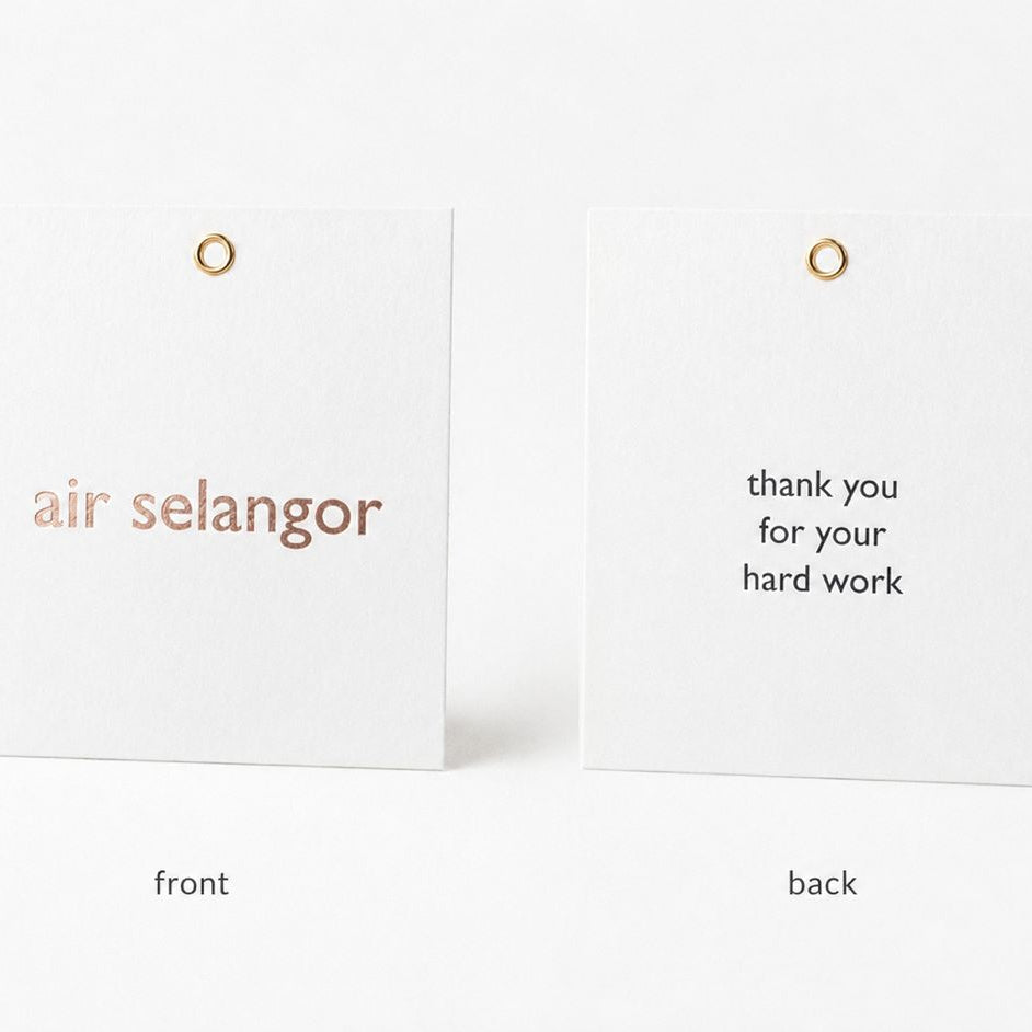 Custom Tagging with Client's Hotstamping (Frontside) & Coloured Printing (Backside)